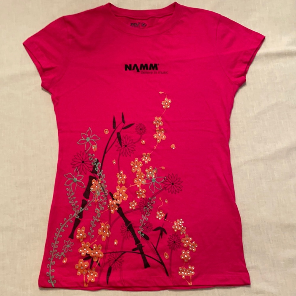 NAMM “Believe in Music” Women’s Hot Pink T-shirt, Size L made by MV Sport.